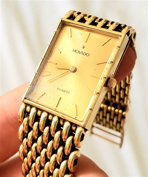 14k gold movado men's watches.